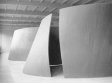 Richard Serra, Double-Torqued Ellipse. Cor-Ten steel, 1997.