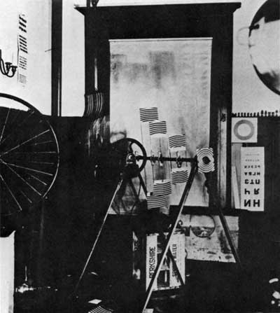 Fig. 18. Marcel Duchamp, Rotary Glass Plates (Precision Optics), 1920. Motorized optical device: painted glass plates, wood and metal braces, metal axis, 184×120 cm. Photographed in Duchamp's studio, 246 West 73rd Street, New York, 1920. Photographer: Man Ray. Yale University Art Gallery, gift of the Société Anomyme.
