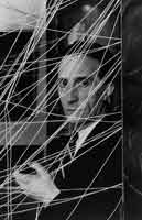 Arnold Newman (American, 1918-2006). Marcel Duchamp with Sixteen Miles of String installation, 1942. --- Philadelphia Museum of Art. Gift of R. Sturgis and Marion B. F. Ingersoll,1945-72-20