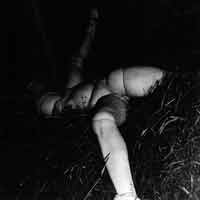 Hans Bellmer. La Poupée (Doll Abandoned in Hayloft), 1938. Vintage gelatin silver print, 14.2×14.5 cm. Ubu Gallery, New York, and Galerie Berinson, Berlin