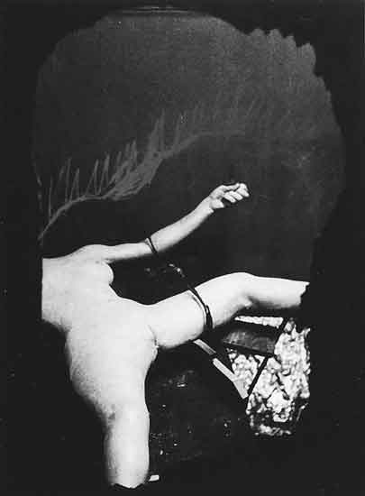 Marcel Duchamp: Photograph of a plaster study for the figure in Étant donnés: 1° la chute d'eau, 2° le gaz d'éclairage, 1959. Gelatin silver print with red crayon, 28,6 × 25,4 cm.