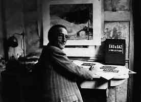 Richard Lusby: Marcel Duchamp with a copy of the deluxe edition of Robert Lebel 's monograph Sur Marcel Duchamp, featuring the Eau & gaz à tous les étages plaque, 1959.