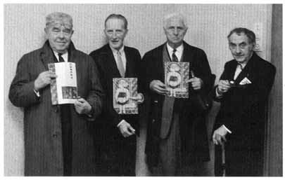 Ed van der Elsken; Left to right: Renė Magritte, Marcel Duchamp, Max Ernst, and Man Ray at the Copley exhibition opening, Stedelijk Museum, Amsterdam, 1966