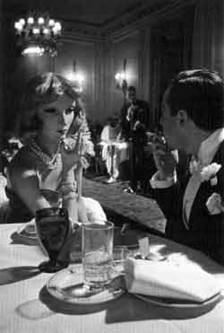 Alfred Eisenstaedt (American, 1898-1995). Cynthia and Lester Gaba, published in Life, December 1937. Gaba and Cynthia dine at the Marguery, a New York restaurant.