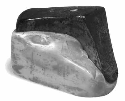 Marcel Duchamp. Coin de chasteté (Wedge of Chastity), 1954. Sculpture in two sections, copper-electroplated plaster and dental plastic, 5.6 × 8.6 x 4.2 cm. Private collection.
