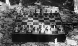 Fragments of Happiness in Art. The Reunion of Electronic Music and Chess. The Reunion chessboard in 1998, set up with the Duchamp handicap. 